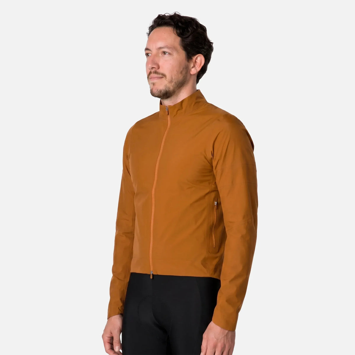 Men's mustard yellow cycling jacket with full zip and side pocket, paired with black bike shorts