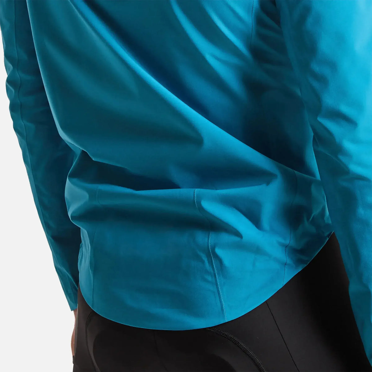 Teal cycling jacket with sleek, wind-resistant fabric and ergonomic fit for performance riding