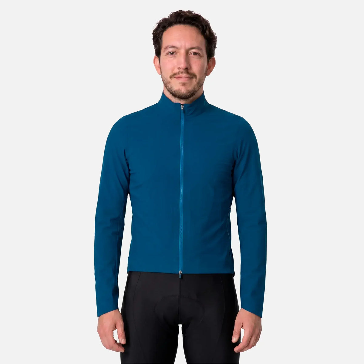 Man wearing teal cycling jacket with full zipper and black cycling shorts
