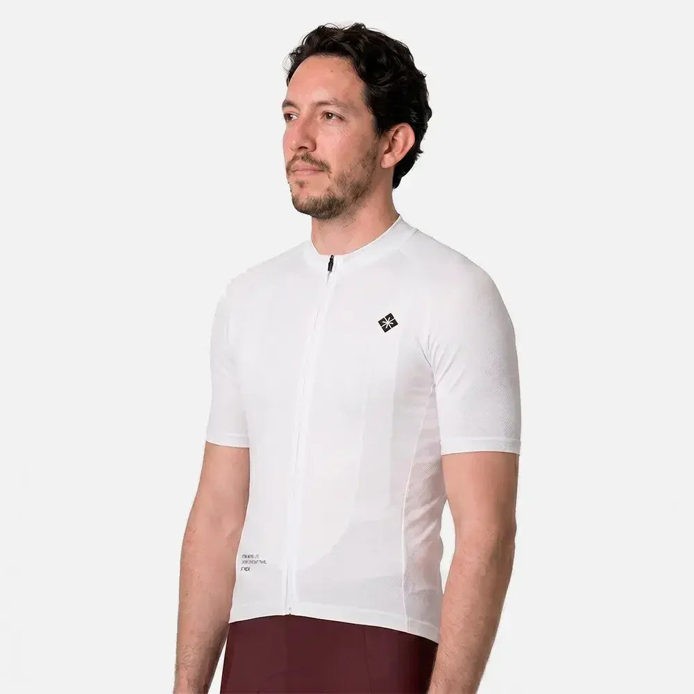 Man wearing white cycling jersey with black logo, short sleeves, and zipper front