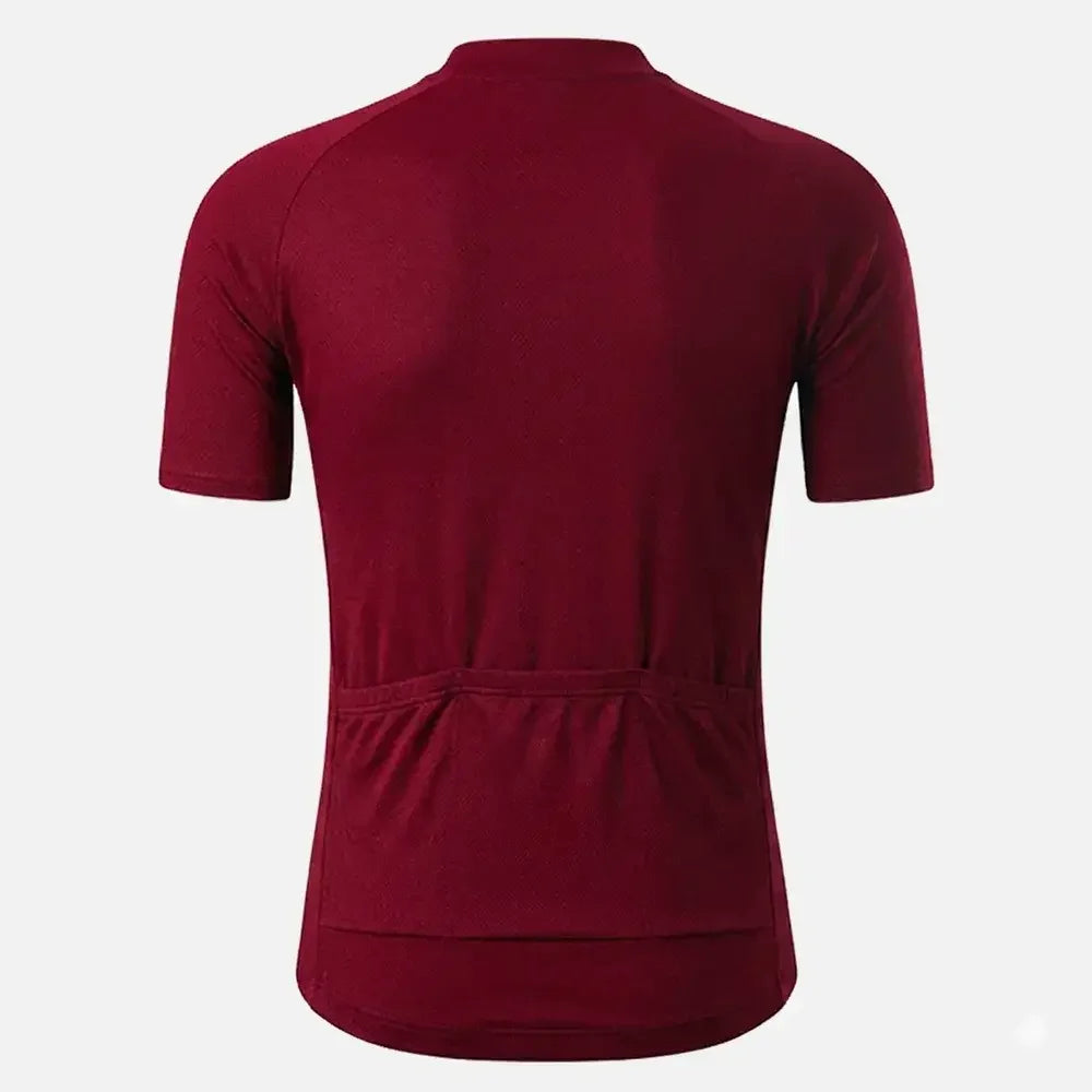 Burgundy cycling jersey with rear pockets, short sleeves, and fitted design for road biking performance