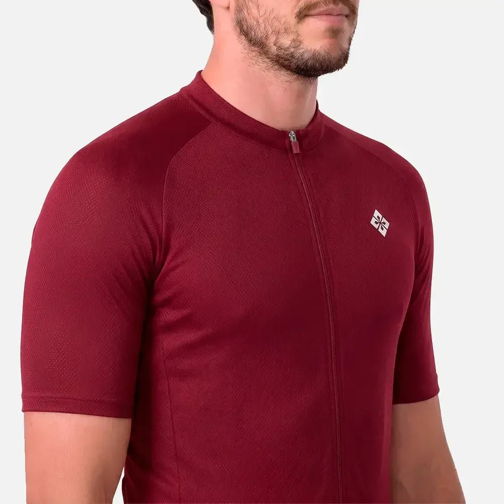 Maroon cycling jersey with front zipper and logo, designed for athletic performance.